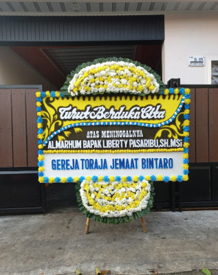 Papan Bunga Duka di Kayoa